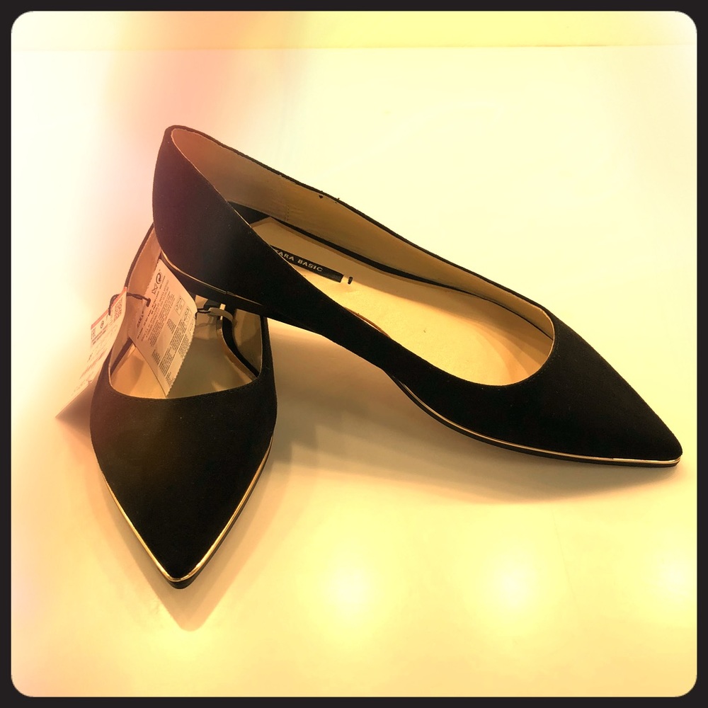 Black pointy suede flats